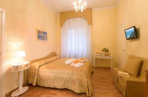 Posteľ alebo postele v izbe v ubytovaní Residence Ancona
