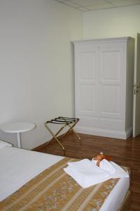 Posteľ alebo postele v izbe v ubytovaní Residence Ancona
