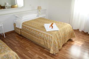 Posteľ alebo postele v izbe v ubytovaní Residence Ancona