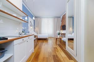 Kuchyň nebo kuchyňský kout v ubytování Apartamenty Bracka 6