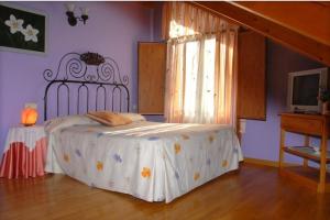 Cama o camas de una habitación en Casa Rural Casa Colom