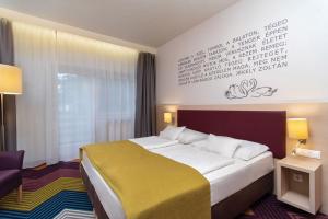 Posteľ alebo postele v izbe v ubytovaní Kolping Family Resort