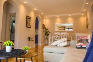 a living room with a couch and a table at Ana's Place in Kotor