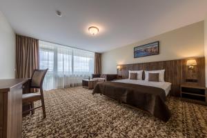 Postel nebo postele na pokoji v ubytování Gradiali Wellness and SPA