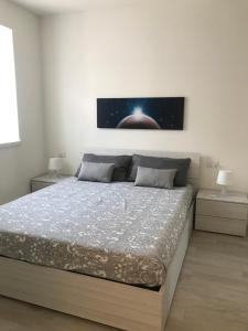 Appartamento Marte 객실 침대