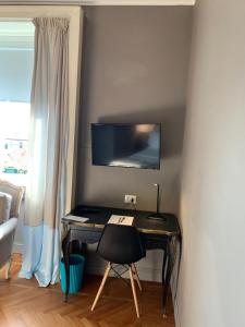 TV a/nebo společenská místnost v ubytování Pattini Guest House
