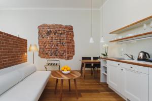 Kuchyň nebo kuchyňský kout v ubytování Apartamenty Bracka 6