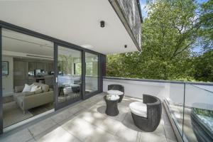 Khu vực ghế ngồi tại Executive Apartments in Bermondsey FREE WIFI & AIRCON by City Stay Aparts London