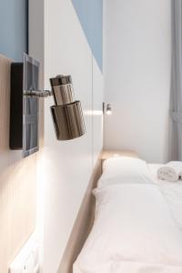 A bed or beds in a room at New Gallery