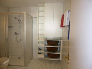 a bathroom with a toilet and a shower at Stieglerhof KG in Illmitz +84 photos
