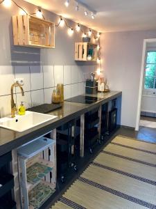 a kitchen with a counter top and a sink at Your cozy hideaway Dome near Dresden in Frauendorf