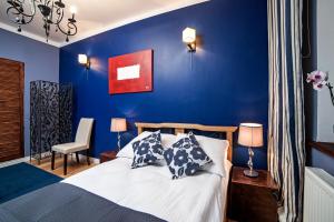 Postel nebo postele na pokoji v ubytování Apartamenty Grunwaldzkie - Parking w cenie + 10 fotografií