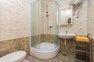 Koupelna v ubytování Apartments Ricina