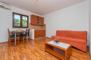 Kuchyň nebo kuchyňský kout v ubytování Apartments Ricina