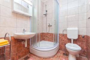 Koupelna v ubytování Apartments Ricina