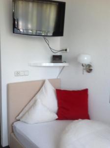 Postel nebo postele na pokoji v ubytování Hotel-Garni Fels