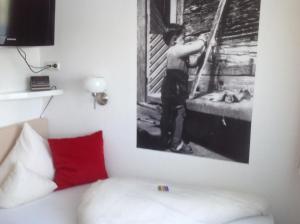 Postel nebo postele na pokoji v ubytování Hotel-Garni Fels