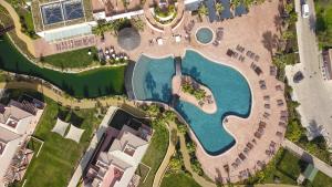 an aerial view of a pool in a resort at Monte Santo Resort in Carvoeiro