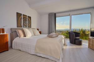 Posteľ alebo postele v izbe v ubytovaní Villa Seven Islands + 32 fotografií