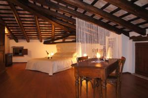 Postel nebo postele na pokoji v ubytování Agriturismo Ronchi Di Sant'Egidio