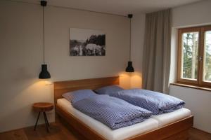 מיטה או מיטות בחדר ב-Gasthaus Am Ödenturm