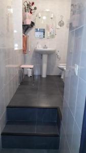 A bathroom at CASA TINA