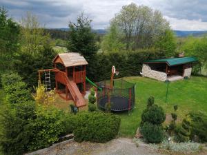 an aerial view of a garden with a playground at W zieleni in Polanica-Zdrój