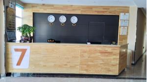The lobby or reception area at 7Days Premium Guyuan Beijing Road Branch