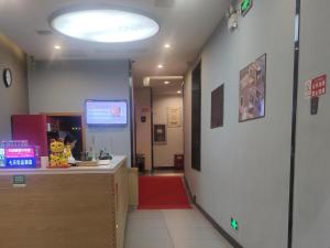 The lobby or reception area at 7Days Premium Huanggang Walking Street Branch