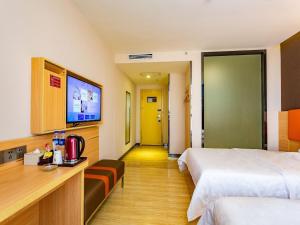 Ένα ή περισσότερα κρεβάτια σε δωμάτιο στο 7Days Premium Chenzhou Guoqing South Road Branch +40 φωτογραφίες