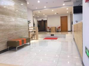The lobby or reception area at 7Days Premium Yibin Riverside Branch