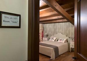 Posteľ alebo postele v izbe v ubytovaní B&B Villa del Sole Relais