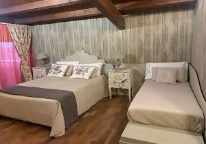 Posteľ alebo postele v izbe v ubytovaní B&B Villa del Sole Relais + 37 fotografií