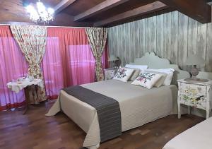 Posteľ alebo postele v izbe v ubytovaní B&B Villa del Sole Relais