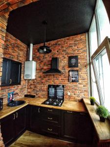 Kuchyňa alebo kuchynka v ubytovaní LOFT 57 CENTRUM