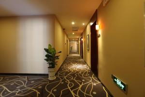 Fotografie z fotogalerie ubytování 7Days Premium Yichang Wanda Plaza Canal Park Branch v destinaci I-čchang