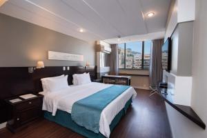 
Cama ou camas em um quarto em Sol Ipanema Hotel
