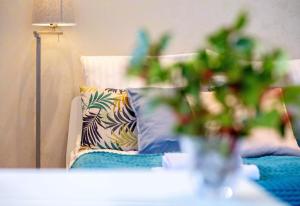 Posteľ alebo postele v izbe v ubytovaní Comfy Apartments - Wypoczynkowa Lux