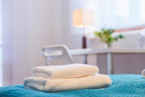 Posteľ alebo postele v izbe v ubytovaní Comfy Apartments - Wypoczynkowa Lux + 18 fotografií
