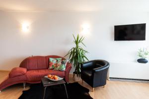 Posezení v ubytování Apartment "Köhler" mit Berg- und Bodenseesicht