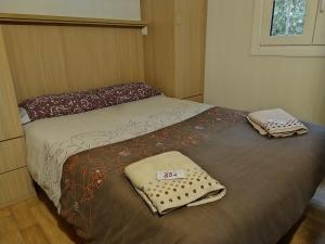 A bed or beds in a room at Camino de Santiago