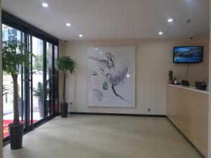 The lobby or reception area at 7Days Premium Hefei Jingshang Trade City Branch
