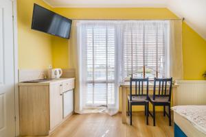 Kuchyň nebo kuchyňský kout v ubytování Morski Diament