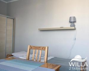 Postel nebo postele na pokoji v ubytování Willa z Tarasami