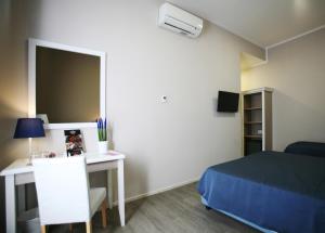 Postel nebo postele na pokoji v ubytování Hotel Magenta