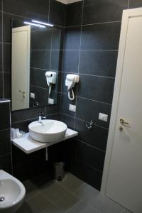 Koupelna v ubytování Hotel Magenta