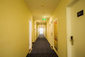 Foto dalla galleria di 7 Days Inn Kunshan South Railway Station Renmin South Road Branch a Suzhou