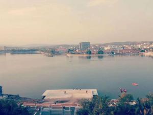 a large body of water with a city in the background at 7Days Inn Changzhi Qinxian Branch in Qinxian