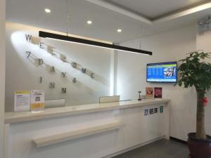 TV a/nebo společenská místnost v ubytování 7Days Inn Tongliao Darunfa Branch