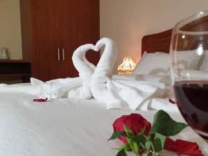 Postel nebo postele na pokoji v ubytování Sapa Symphony Hotel